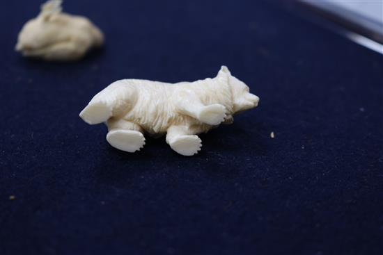 A carved ivory animal group